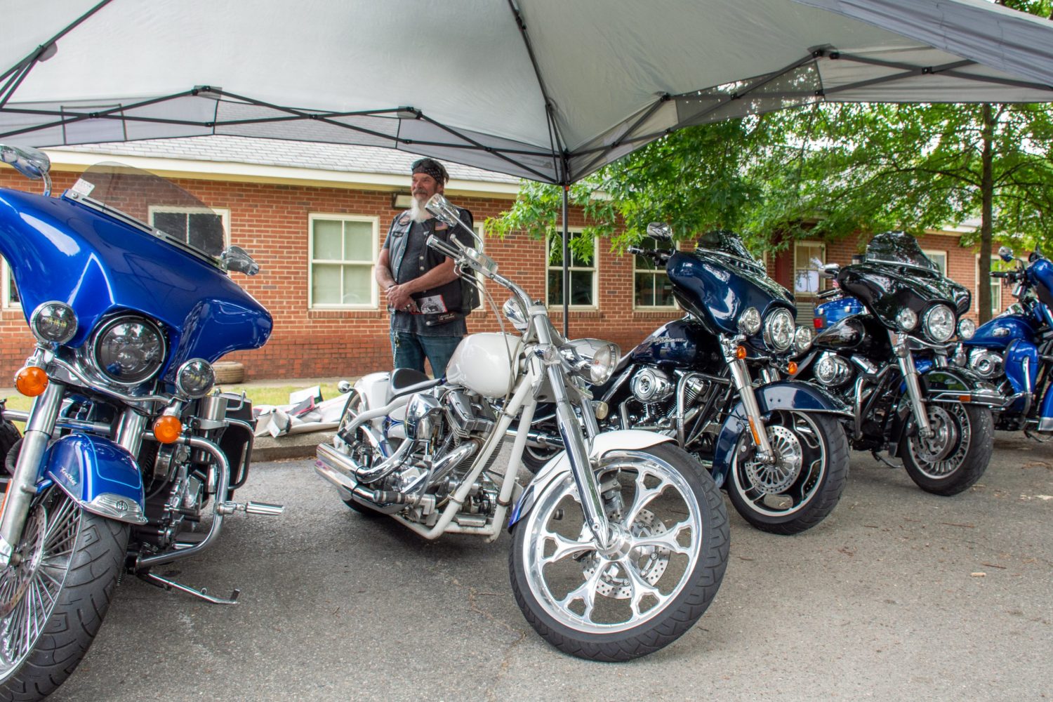 motorcycles under a tent